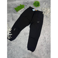 Штани Nike Nocta чорні чоловічі штани Найк Нокта спортивні чорні штани Найк Нокта нейлонові водовідштовхуючий