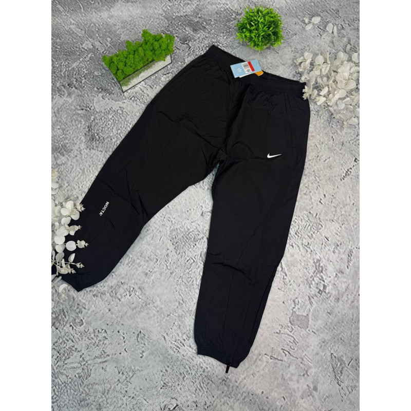 Штани Nike Nocta чорні чоловічі штани Найк Нокта спортивні чорні штани Найк Нокта нейлонові водовідштовхуючий